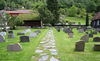 Flåm kyrkje, kyrkjegarden nord for kyrkja, sett mot aust, AMH 2011.jpg